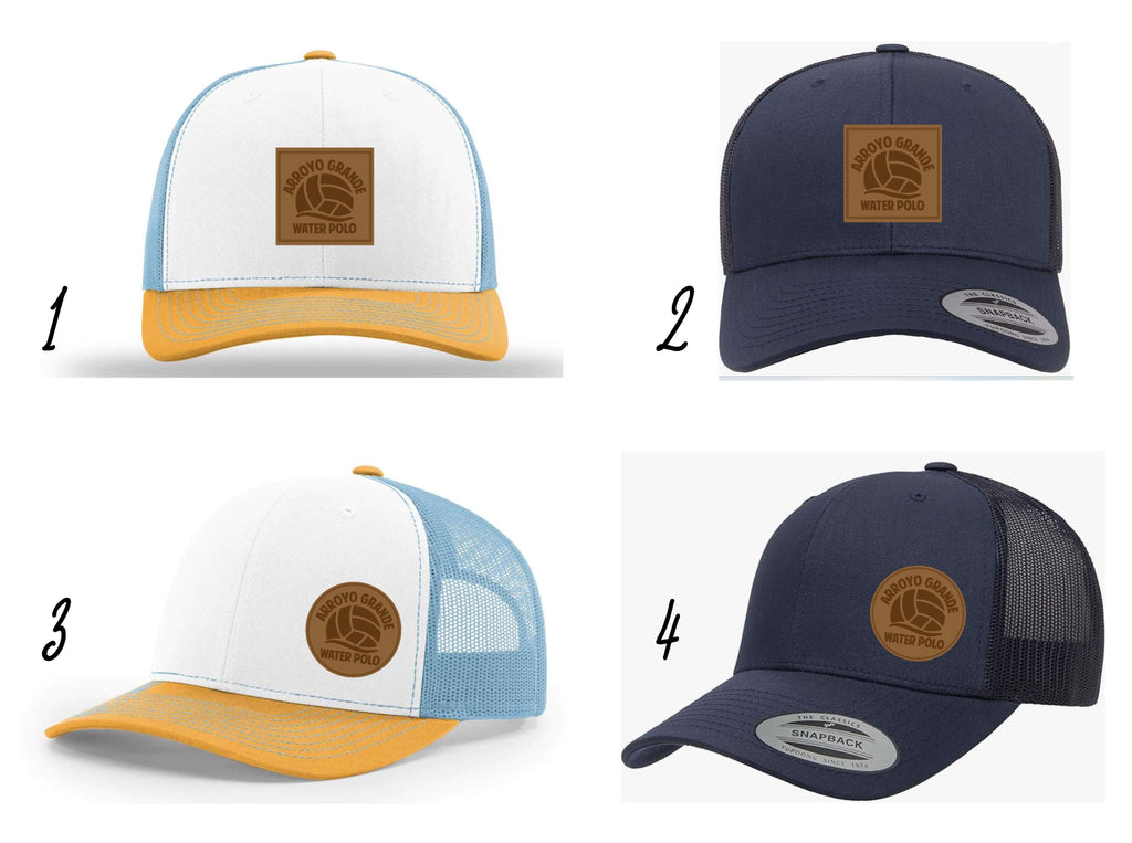 Four options for trucker hat; all navy with square or offset circle patch, tricolor yellow/white/light blue with square or offset circle patch.
