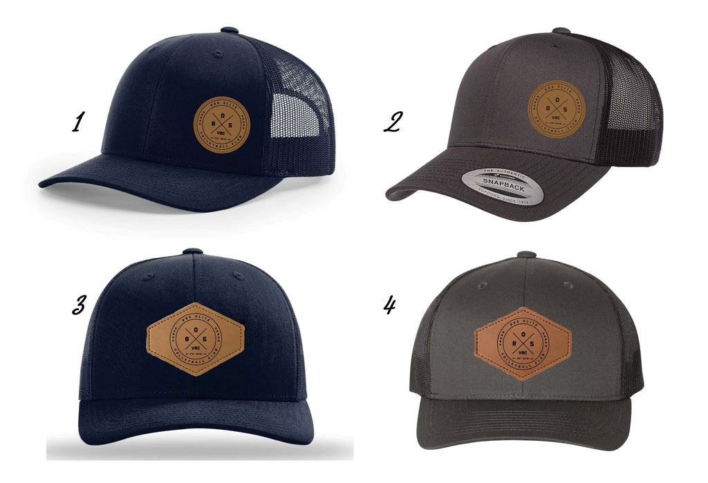 Navy and Charcoal trucker hat with mesh adjustable back, choice of engraved logo leather patch.